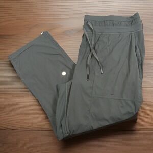 Lululemon Dance Studio Crop *24" Women 12 Dark Olive Woven Lightweight Cinch Hem